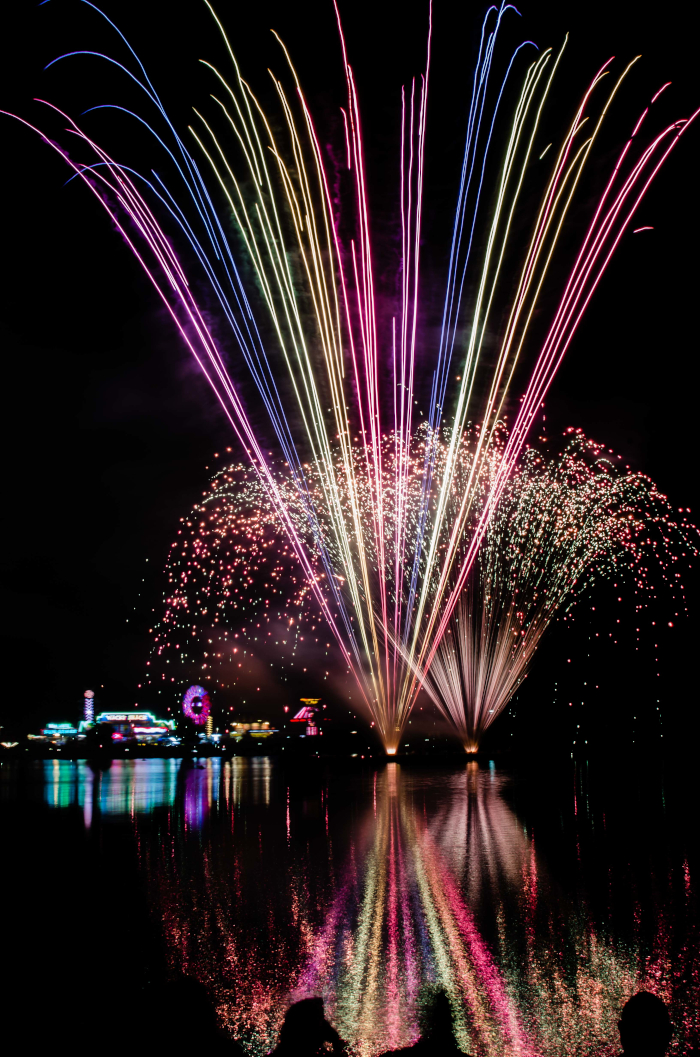 Fireworks and carnival across lagoon